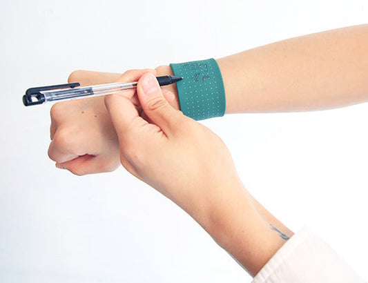 Erasable clapping wristband notebook